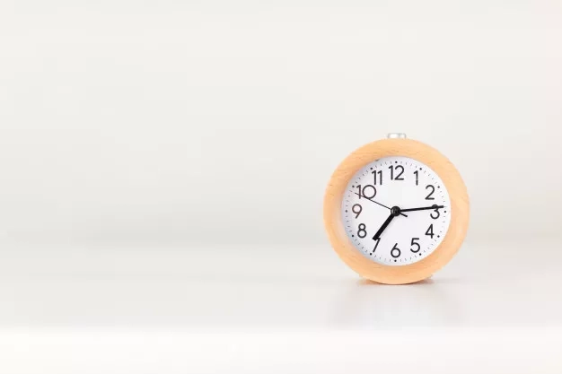 clock on a table stand